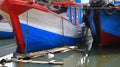 Photo documentation of fishing boats leaning