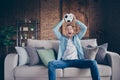 Photo of domestic handsome guy relaxing stay home quarantine time watch football match champion league europe raise Royalty Free Stock Photo