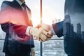 Photo Double exposure of business partnership handshake and modern city skyline, symbolizing successful agreements