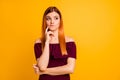 Photo of doubtful funky woman wear red outfit finger chin looking empty space isolated yellow color background Royalty Free Stock Photo