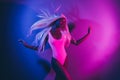 Photo of dreamy alluring trendy female enjoy nightlife express herself visit concert isolated on pink shimmer background