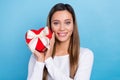 Photo of dreamy charming woman wear white shirt holding red chocolate sweets box isolated blue color background Royalty Free Stock Photo