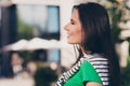 Photo of dreamy good mood girl dressed green top walking cafeteria enjoying sunshine outdoors urban town park Royalty Free Stock Photo