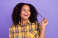 Photo of dreamy happy positive dark skin woman split ends haircare isolated on violet color background