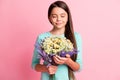 Photo of dreamy lovely pretty small hispanic lady long hairdo hands hold bouquet fresh summer flowers eyes closed Royalty Free Stock Photo