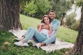 Photo of dreamy sweet boyfriend girlfriend wear casual outfits sitting grass hugging enjoying sunny weather outdoors Royalty Free Stock Photo