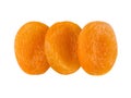 Photo of dried apricots high resolution isolated on white background. A set of three pieces, top view. Royalty Free Stock Photo