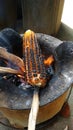 Photo of driedup corn on fire