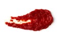 Photo of a drop of red tomato paste smear isolated on a white background. Royalty Free Stock Photo