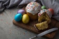 Photo of Easter cake and eggs. Traditional Russian and Ukrainian Easter cake kulich and painted eggs