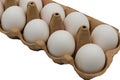 Carton box with white eggs.