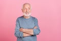 Photo of elder grey hairdo man crossed arms look promo wear blue shirt isolated on pink color background Royalty Free Stock Photo