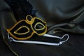 Photo of elegant and delicate Venetian mask over black silk background. Coronavirus prevention concept Royalty Free Stock Photo