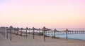 Photo of an empty beach at a purple sunset Royalty Free Stock Photo