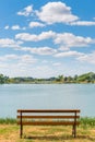 Photo empty bench on the lake Royalty Free Stock Photo