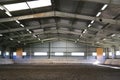 Photo of an empty indoor riding hall for horses and riders Royalty Free Stock Photo