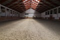 Photo of an empty indoor riding hall for horses and riders Royalty Free Stock Photo