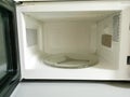 Photo of empty interior microwave oven. Royalty Free Stock Photo