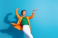 Photo of energetic young businesswoman formal elegant clothes hands up rhythm boogie woogie look mockup isolated on blue
