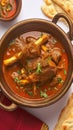 Photo Enjoy the rich flavors of Lamb Rogan Josh with Naan.