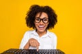 Photo of excited attractive lady finger press keyboard wear smart casual isolated on yellow color background Royalty Free Stock Photo