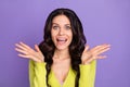 Photo of excited crazy brunette lady open mouth palms wear green cardigan isolated purple color background