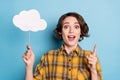 Photo of excited creative lady hold cloud card have great idea wear plaid shirt isolated blue color background
