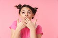 Photo of excited girl expressing surprise and covering her mouth Royalty Free Stock Photo