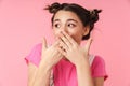 Photo of excited girl expressing surprise and covering her mouth Royalty Free Stock Photo