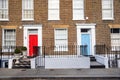 Traditional British Terraced Houses with Colourful Doors Royalty Free Stock Photo