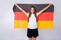 Photo of fan lady raise big germany flag coat support country world soccer league cup pretty cheerleader wear football Royalty Free Stock Photo