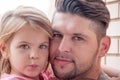 Photo of father and daughter close-up.