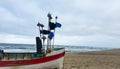 Fishing marker flags on the boat at the beach