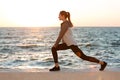 Photo of fit young woman doing stretching exercise Royalty Free Stock Photo