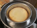 Flan Being Cooked in a Double Boiler