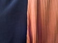The folded blue and orange cloth background has a shadow Royalty Free Stock Photo