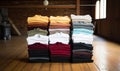 Photo of folded clothes on a wooden floor Royalty Free Stock Photo