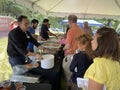 Serving Food at the Church 75th Year Celebration in June in Spring