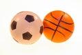 Photo of football and basketball balls on a light background Royalty Free Stock Photo