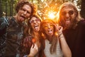 Photo of four hippie people men and women, smiling and taking se Royalty Free Stock Photo