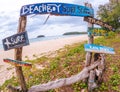 A photo frame on the beach invites you to surf Phuket Thailand