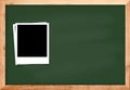 Photo frame on black wood blackboard background for school conce Royalty Free Stock Photo