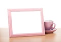 Photo frame and coffee cup Royalty Free Stock Photo