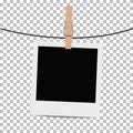 Photo frame hung on rope with clothespin on transparent background. Royalty Free Stock Photo