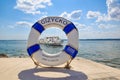 Photo frame (Lifebuoy) with a cruise ship sailing on Lake Niegocin, Gizycko, Masuria, Poland.
