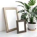 Photo frame mockup on table and plant in 3D rendering isolated on white background Royalty Free Stock Photo