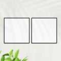 Photo frame mockup on white wall. Poster mockup. Clean, modern, minimal frame. Minimalist background. Blank picture frame mockup. Royalty Free Stock Photo