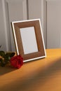 Photo frame with red rose Royalty Free Stock Photo