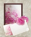 Photo frame with roses and paper Royalty Free Stock Photo