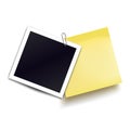 Photo frame and yellow sticky note attached metal paper clip. Metal paper clip attached to retro photorealistic photo frame.